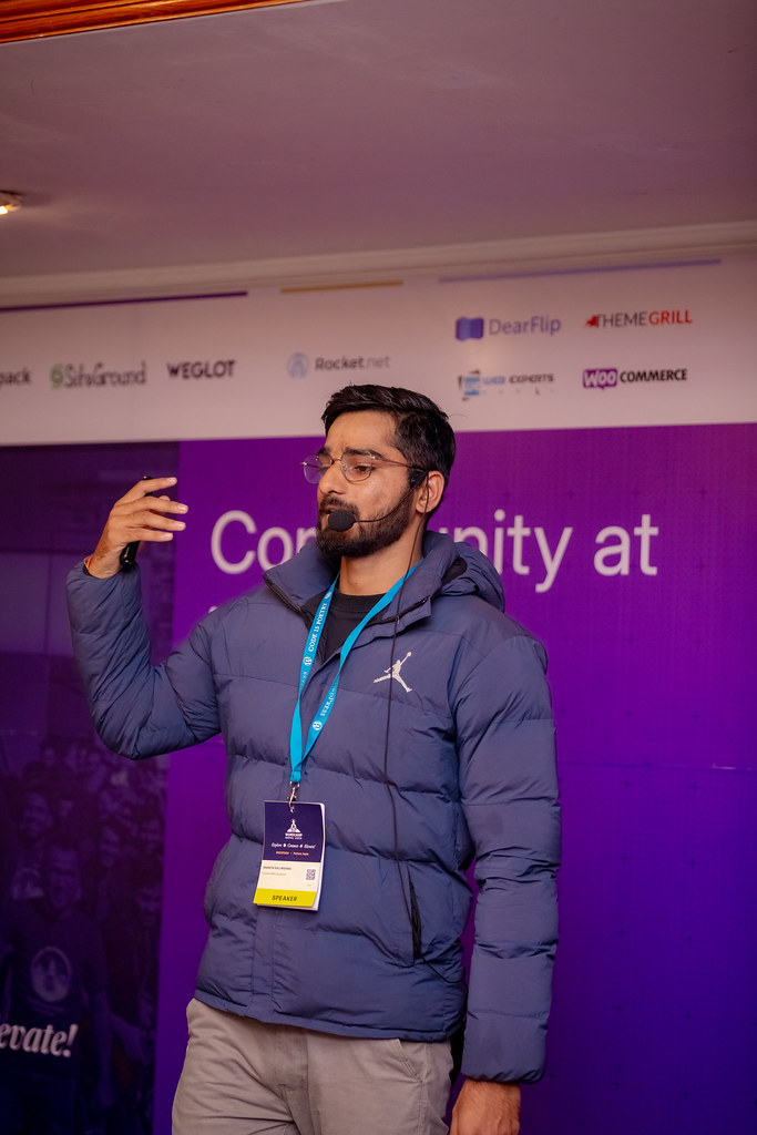 Ananta on stage presenting design principles and WordPress UI craftsmanship
